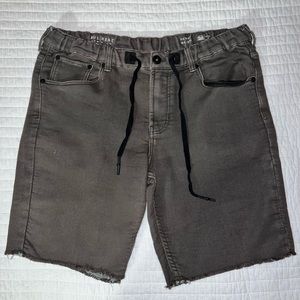 Passing Skinny Olive Shorts